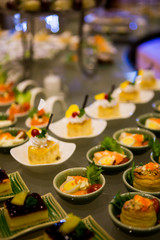 Close-up view of dessert buffet with delicious sweet bakery and