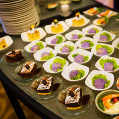 Close-up view of dessert buffet with delicious sweet bakery and