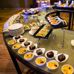 Close-up view of dessert buffet with delicious sweet bakery and