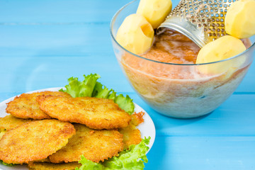 Potato pancakes, homemade cooking concept, vegetarian food recip