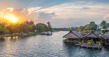 Fototapeta premium Tourists restaurants on the floating house rafting at the river