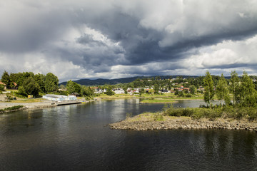 Fototapeta na wymiar Norway Honefoss landscape river fjords and sky 01.07.2014