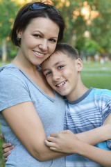 Mother with son in park