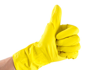 yellow glove for cleaning on womans arm show thumbs up