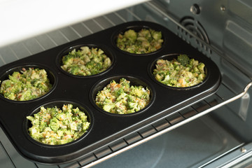 Healthy lifestyle and cooking concept - broccoli cheese bites