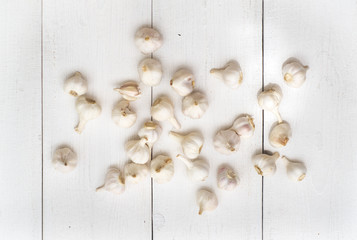 Top view of the garlic on a white table