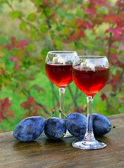 plum drink in a glass wineglass