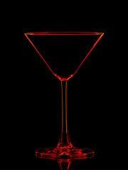 Silhouette of red martini glass with clipping path on black background.
