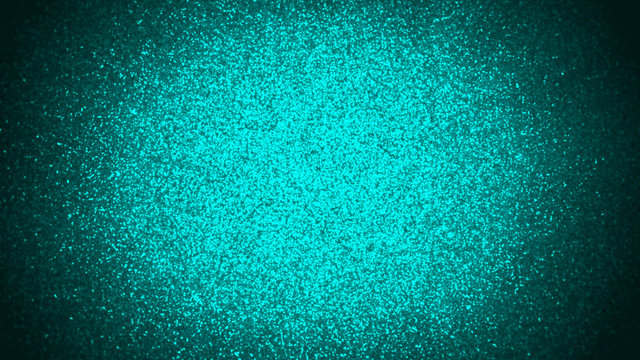 twinkling turquoise glitter lit by a bright spotlight with a dark vignette
