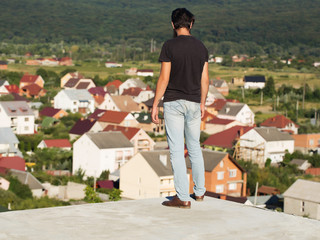 Young man enjoys rural scenery