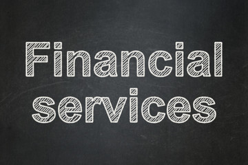Obraz premium Banking concept: Financial Services on chalkboard background