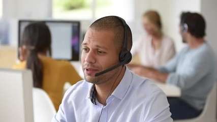 Customer service operator working in office