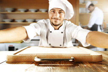 young cook chef making selfie 
