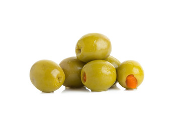 Green olives stuffed with red paprika isolated on white