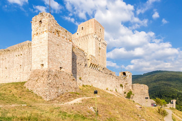 Fototapeta na wymiar Assisi, Italy. Towers and walls of Rocca Maggiore