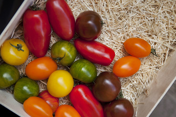 Tomato in a wooden crate
