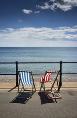 Fototapeta na wymiar Deck Chairs on Promenade