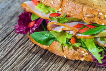 Ham salad sandwich on rustic table