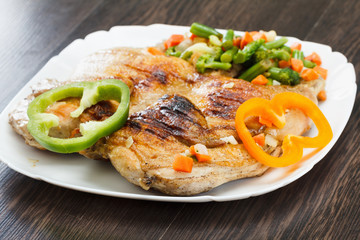 Chicken fried with vegetables