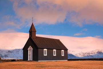 Fototapeta na wymiar Black Church of Budir in Iceland sunset