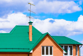 house with a gable roof window