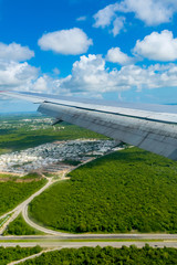 view of the wing of an airplane through the window