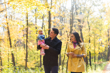 Portrait Of Happy Family In Garden