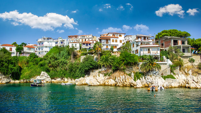Skiathos town on Skiathos Island, Greece. Beautiful view of the old town with boats in the harbor.