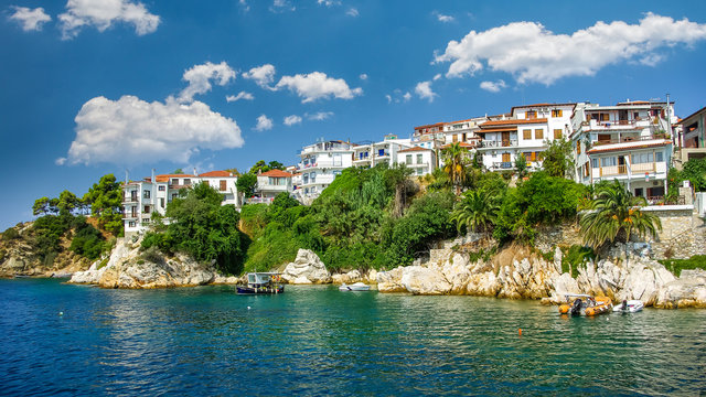 Skiathos town on Skiathos Island, Greece. Beautiful view of the old town with boats in the harbor.