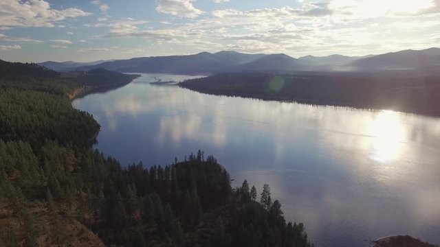 Magnificent Lighting for Lake Roosevelt Aerial with Scattered Clouds and Lens Flare