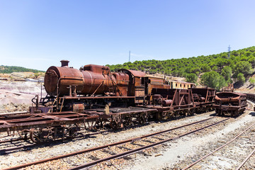 Fototapeta na wymiar Tren a vapor usado en mineria