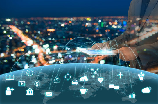 businessman in brown suite using tablet control the world , inte