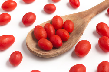 Cherry Tomatoes into a spoon