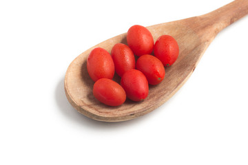 Cherry Tomatoes into a spoon
