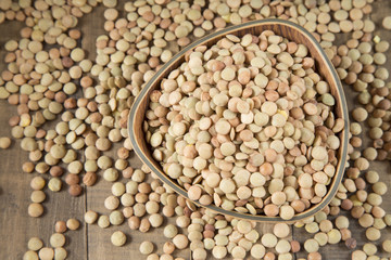 Grains of lentils in a bowl - Lens culinaris