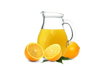 Delicious orange juice in jug with sliced fruits isolated on white background