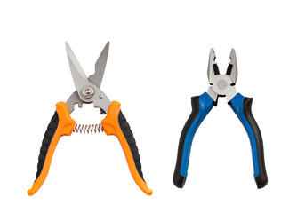 Opened pliers and nippers on the white background