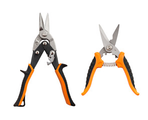 Opened pliers and nippers on the white background