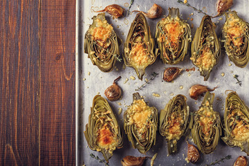 Artichokes baked with cheese, garlic and thyme.