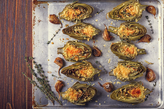 Artichokes baked with cheese, garlic and thyme.