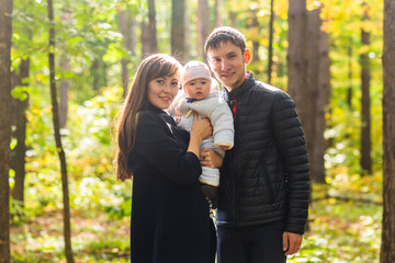 Portrait Of Happy Family In Garden