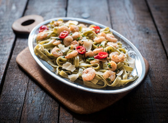Shrimps and tagliatelle served