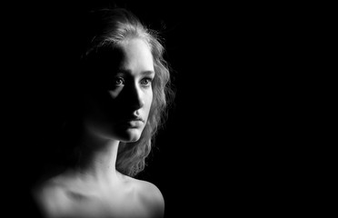 sad girl with bared shoulders