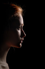 profile of young pensive woman