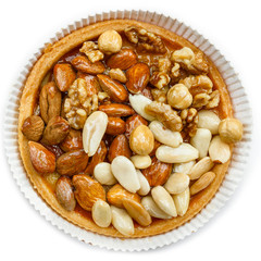 Tart with nuts on white background