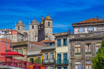 Colorful facades of old houses and Monument Church Of St Francis in Porto, Portugal