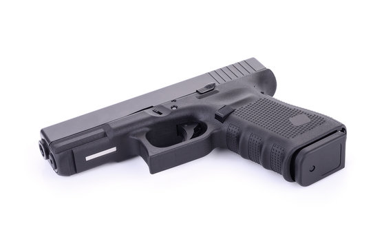 Automatic 9 m.m handgun pistol isolated on white