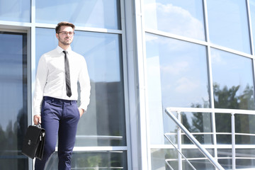 Fototapeta premium Handsome young lawyer at office building