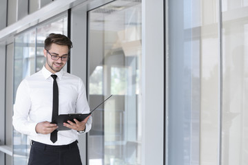 Fototapeta premium Handsome young lawyer at office building