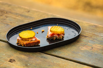 pieces of bread outdoor on wooden table